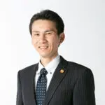 山岸 忠義